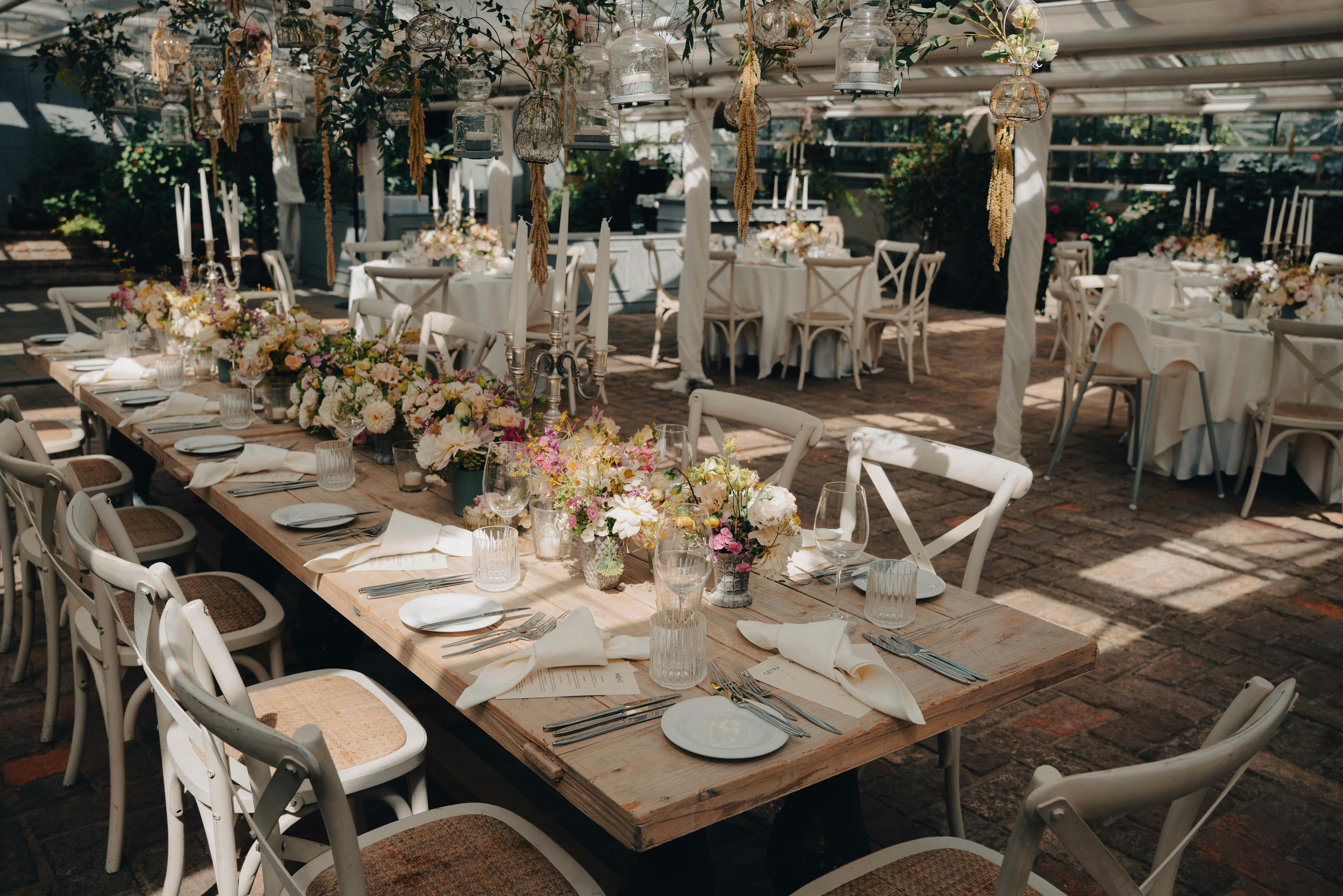 Romantic wedding floral arrangement with blush and white blooms by Jude's Blooms, a South African florist